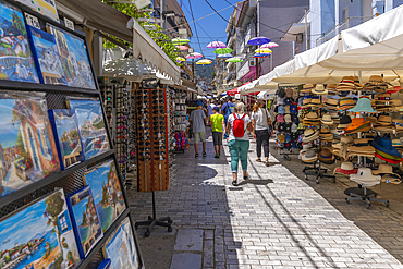 View of souvenir shops and tourists in Thassos Town, Thassos, Aegean Sea, Greek Islands, Greece, Europe