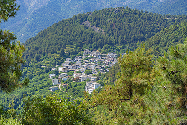 View of woodland and village of Panagia nestled in the hillside, Makriammos, Thassos, Aegean Sea, Greek Islands, Greece, Europe