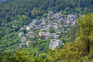 View of woodland and village of Panagia nestled in the hillside, Makriammos, Thassos, Aegean Sea, Greek Islands, Greece, Europe