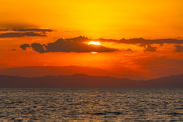 View of sunset and Aegean Sea from Thassos Town, Thassos, Aegean Sea, Greek Islands, Greece, Europe