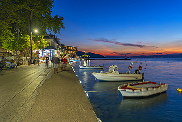 View of boats in old harbour at dusk, Thassos Town, Thassos, Aegean Sea, Greek Islands, Greece, Europe