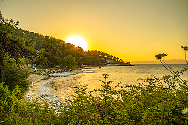 View of Nisteri Beach at sunset, Thassos Town, Thassos, Aegean Sea, Greek Islands, Greece, Europe