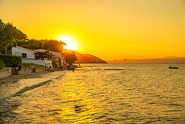 View of Nisteri Beach at sunset, Thassos Town, Thassos, Aegean Sea, Greek Islands, Greece, Europe