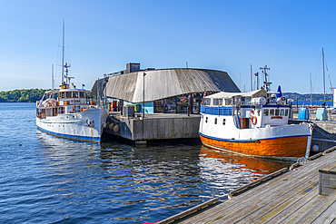 View of boats at the waterfront, Aker Brygge, Oslo, Norway, Scandinavia, Europe