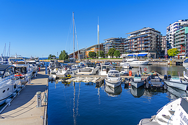 View of boats and architecture at the waterfront, Aker Brygge, Oslo, Norway, Scandinavia, Europe