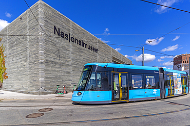 View of The National Museum and city tram, Aker Brygge, Oslo, Norway, Scandinavia, Europe