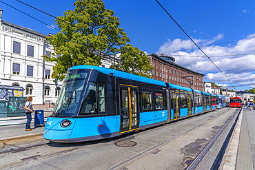 View of city tram on Henrik Ibsens Gate, Aker Brygge, Oslo, Norway, Scandinavia, Europe