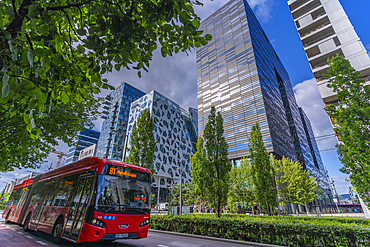 View of city bus and contemporary architecture in the Barcode area on a sunny day, Oslo, Norway, Scandinavia, Europe