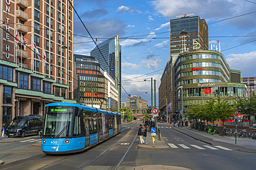 View of buildings and city tram in Jernbanetorget, Oslo, Norway, Scandinavia, Europe