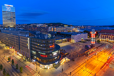 View of Jernbanetorget and city skyline from elevated position at dusk, Oslo, Norway, Scandinavia, Europe