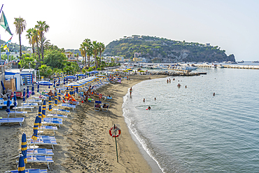 View of beach and town of Lacco Ameno, Island of Ischia, Campania, Italy, Europe