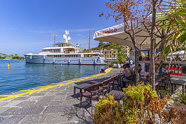 View of boats and bar in Porto d'Ischia (Port of Ischia), Island of Ischia, Campania, Italy, Europe