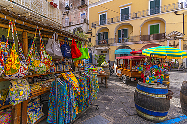 View of shop and cafe near Aragonese Castle, Port of Ischia, Island of Ischia, Campania, Italy, Europe