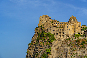 View of Aragonese Castle at sunset, Port of Ischia, Island of Ischia, Campania, Italy, Europe