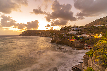 View of coastline at dusk from Sant'Angelo, Sant'Angelo, Island of Ischia, Campania, Italy, Europe