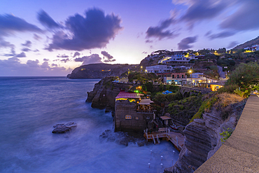 View of coastline at dusk from Sant'Angelo, Sant'Angelo, Island of Ischia, Campania, Italy, Europe