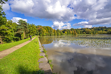 View of dramatic clouds refecting in Hardwick Ponds, Hardwick Park, Hardwick Hall, Bolsover, Derbyshire, England, United Kingdom, Europe