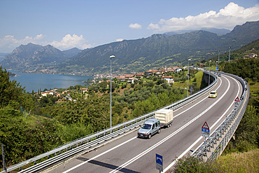 Lake and the S10 road, Lake Iseo, Lombardy, Italian Lakes, Italy, Europe