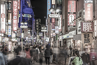 View of busy street and neon lights at night in Shibuya District, Kamiyamacho, Shibuya City, Tokyo, Japan, Asia