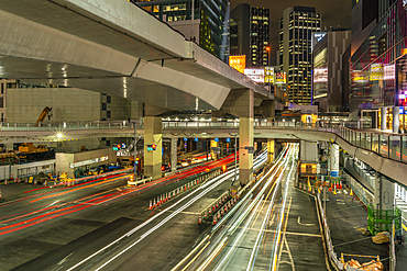 View of buildings and trail lights around Shibuya Station area at night, Shibuya District, Kamiyamacho, Shibuya City, Tokyo, Japan, Asia