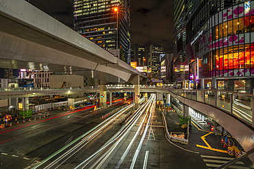 View of buildings and trail lights around Shibuya Station area at night, Shibuya District, Kamiyamacho, Shibuya City, Tokyo, Japan, Asia