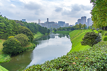 View of city buildings and Sakuradabori Moat of the Imperial Palace, Chiyoda, Tokyo, Honshu, Japan