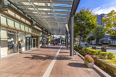 View of street leading to Kanazawa station, Kanazawa City, Ishikawa Prefecture, Honshu, Japan, Asia