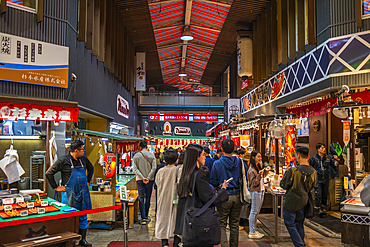 View of people in busy Omicho Market, Kanazawa City, Ishikawa Prefecture, Honshu, Japan