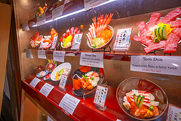 View of colourful frontage of restaurant in Omicho Market, Kanazawa City, Ishikawa Prefecture, Honshu, Japan, Asia