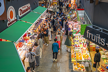 Elevated view of stalls and people in Omicho Market, Kanazawa City, Ishikawa Prefecture, Honshu, Japan