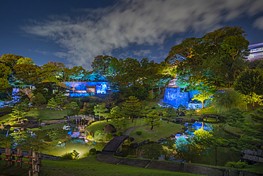 View of Mokukyo Japanese Garden illuminated at dusk, Kanazawa City, Ishikawa Prefecture, Honshu, Japan