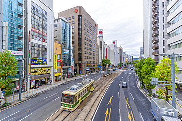 Elevated view of traffic and tram on major street during daytime, Hondori, Naka Ward, Hiroshima, Honshu, Japan