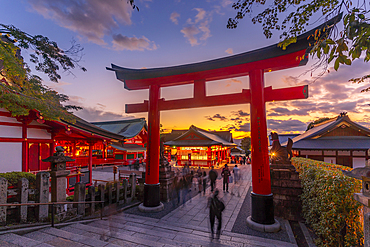 View of Torii Gate at Kyoto's Fushimi Inari Buddist Temple at dusk, Fukakusa Yabunouchicho, Fushimi Ward, Kyoto, Japan, Asia