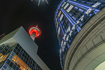 View of Nidec Kyoto Tower and nearby buildings at night, Shimogyo Ward, Higashishiokoji Kamadonocho, Kyoto, Honshu, Japan