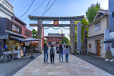 View of Shitennoji Ishinotorii (Stone Torii Gate) on a sunny day, Shitennoji, Tennoji Ward, Osaka, Honshu, Japan