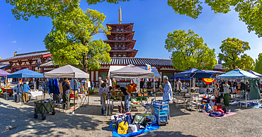 View of market stalls and Shitenno-ji Gojunoto (Five Story Pagoda) on a sunny day, Shitennoji, Tennoji Ward, Osaka, Honshu, Japan, Asia