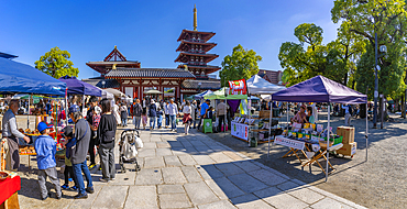 View of market stalls and Shitenno-ji Gojunoto (Five Story Pagoda) on a sunny day, Shitennoji, Tennoji Ward, Osaka, Honshu, Japan, Asia