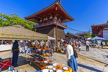 View of market stalls and Kita-indogane-do on a sunny day, Shitennoji, Tennoji Ward, Osaka, Honshu, Japan, Asia