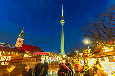 View of Berlin TV Tower, St. Mary's Church and Christmas market in Wasserkaskaden at dusk, Mitte, Berlin, Germany, Europe