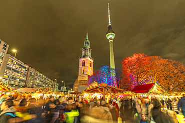 View of Berlin TV Tower, St. Mary's Church and Christmas market in Wasserkaskaden at dusk, Mitte, Berlin, Germany, Europe