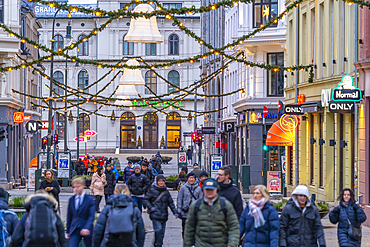 View of Christmas decorations and Oslo Central Station on Karl Johans Gate at dusk, Oslo, Norway, Scandinavia, Europe