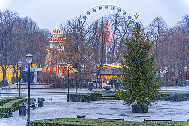 View of Christmas market and ferris wheel during winter at dusk, Stortingsparken, Oslo, Norway, Scandinavia, Europe