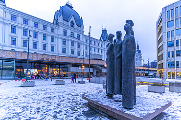 View of Victoria Terrasse and Turid Angell Eng sculpture in Johan Svendsens Plass during winter, Oslo, Norway, Scandinavia, Europe