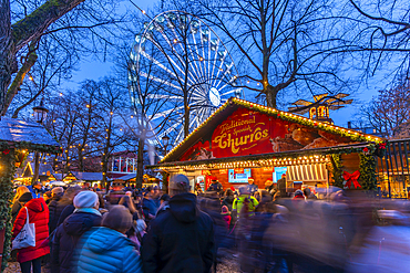 View of Christmas market and ferris wheel during winter at dusk, Stortingsparken, Oslo, Norway, Scandinavia, Europe