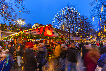 View of Christmas market and ferris wheel during winter at dusk, Stortingsparken, Oslo, Norway, Scandinavia, Europe