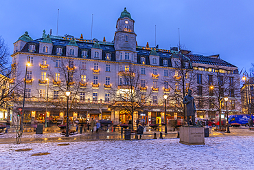 View of Grand Hotel on Karl Johans Gate during winter at dusk, Oslo, Norway, Scandinavia, Europe