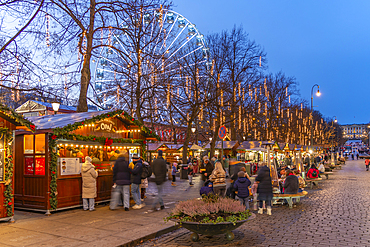 View of Christmas market and ferris wheel on Karl Johans Gate at dusk, Oslo, Norway, Scandinavia, Europe