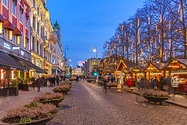 View of Christmas market on Karl Johans Gate at dusk, Oslo, Norway, Scandinavia, Europe