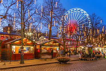 View of Christmas market and ferris wheel on Karl Johans Gate at dusk, Oslo, Norway, Scandinavia, Europe