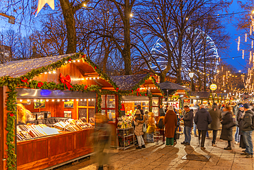 View of Christmas market and ferris wheel on Karl Johans Gate at dusk, Oslo, Norway, Scandinavia, Europe